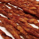 Illustration for article titled Is this twisted new hack the best way to cook bacon?